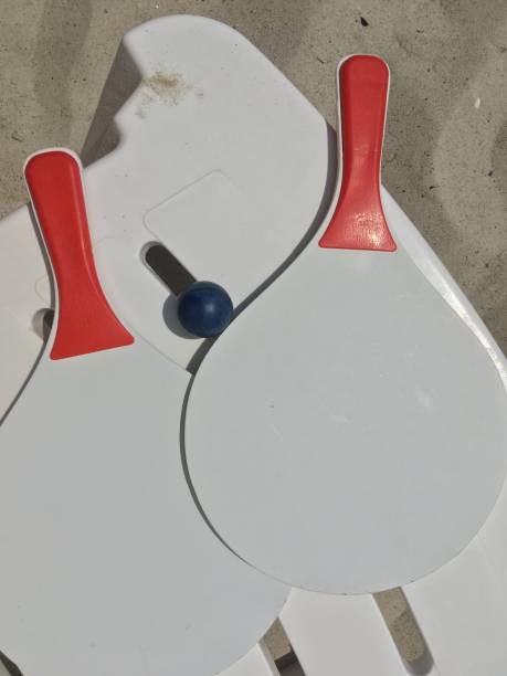 istock Beach ball in sand coast 999353290