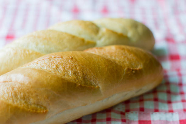 istock fresh baguettes close-up on 999354874