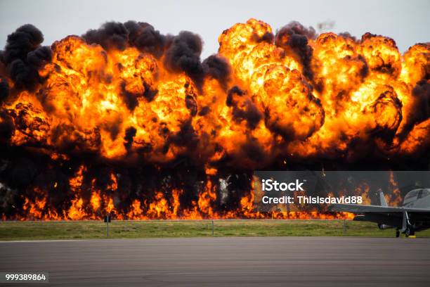 Explosion On An Air Field Stock Photo - Download Image Now - Exploding, Shooting a Weapon, Fire - Natural Phenomenon