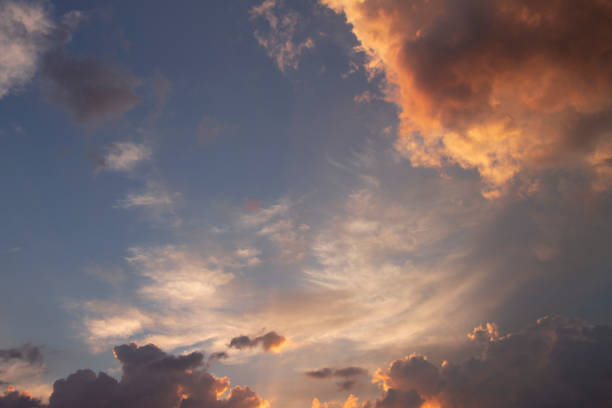 istock Blue sky with colorful clouds at sunset 999410718