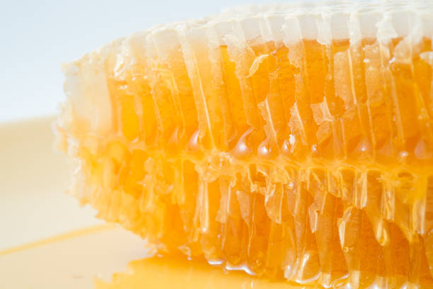 istock Bee honeycombs with honey closeup, a natural background 999411190