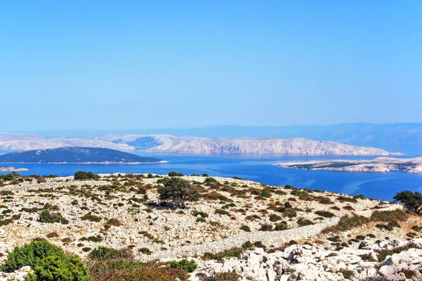 view from the mountan kamenjak of the island rab to the adriatic sea with different croatian islands - scree imagens e fotografias de stock