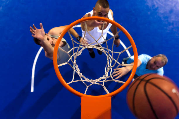 istock Group of friends playing basketball 999441848