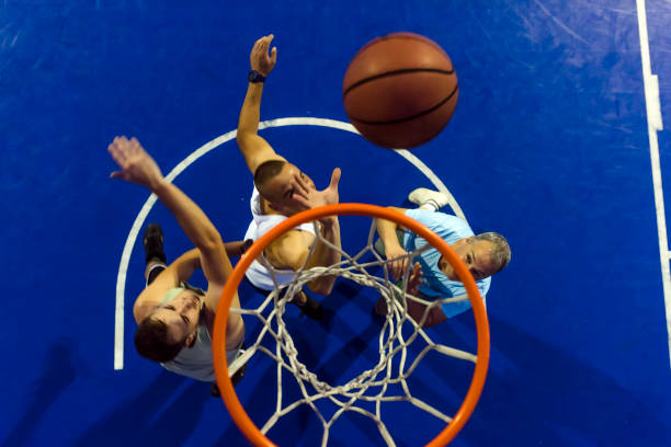 istock Fighting for a ball on basketball match! 999445460