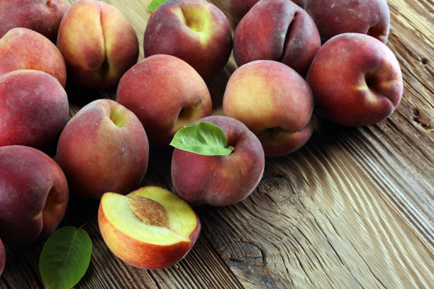 istock A group of ripe peaches on table 999453318