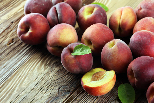 istock A group of ripe peaches on table 999462630