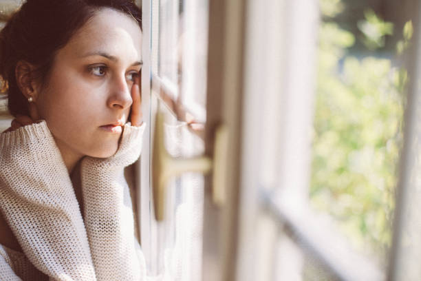 istock Depressed woman in home 999463646