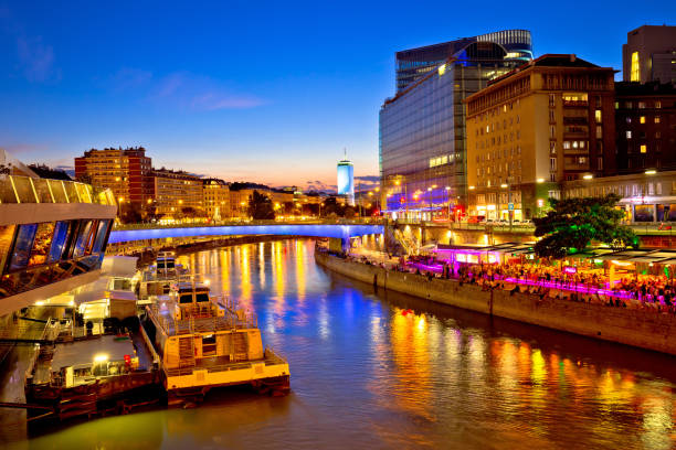 Vienna city modern riverfront evening view, capital of Austria