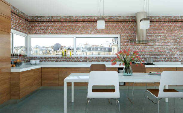 istock Wooden modern kitchen in a loft with stone wall 999487062