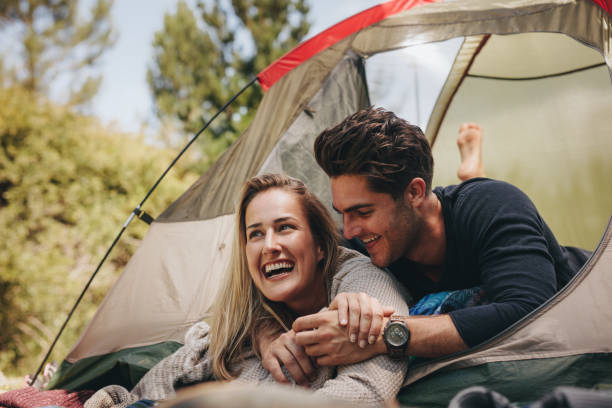 istock Loving young couple camping in nature 999490158
