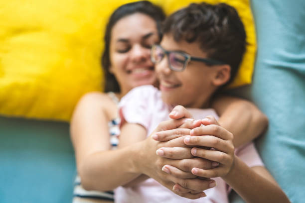 istock Mother and son holding hands 999497466