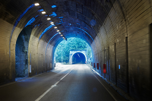 road tunnel through the dolomites in italy