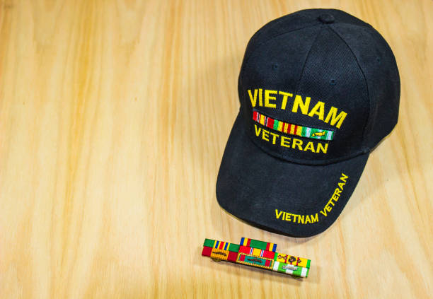 Vietnam Veteran Cap & Service Ribbons On Wood Grain Background