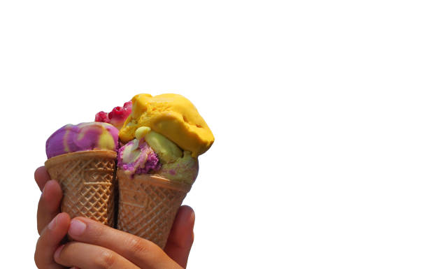 istock hand held different color and flavored ice cream with isolated background 999530718
