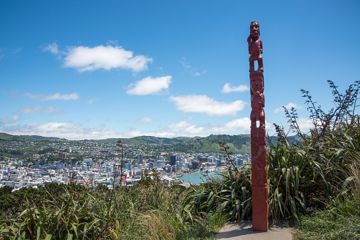 Wellington, North Island, New Zealand-December 14,2016: Mt. Victoria totem pole and view of cityscape in Wellington, New Zealand