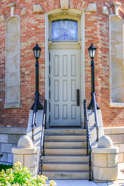 istock Tall door with stairs leading up 999597232