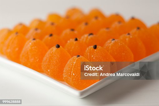 istock orange fruit jelly on a white plate 999628888