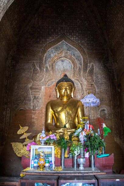 Myanmar: Dhammayazika Pagoda A statue of Buddha in the Dhammayazika Pagoda (Dhamma Ya Zi Ka Pagoda) in Bagan. dhammayazika pagoda stock pictures, royalty-free photos & images