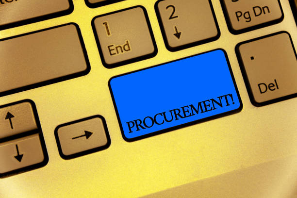 istock Writing note showing Procurement Motivational Call. Business photo showcasing Procuring Purchase of equipment and supplies Keyboard brown key yellow laptop computer keypad notebook netbook. 999656740