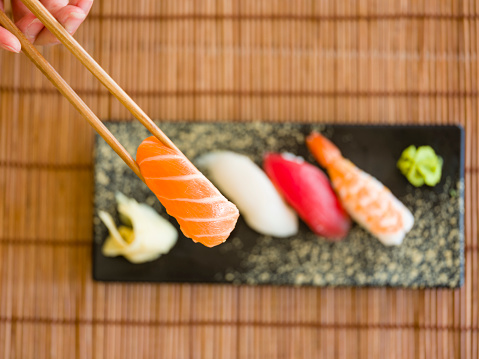 A close up of a nigiri sushi plate.