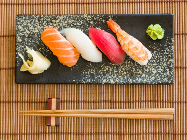 Sushi Plate A close up of a nigiri sushi plate. sushi plate stock pictures, royalty-free photos & images