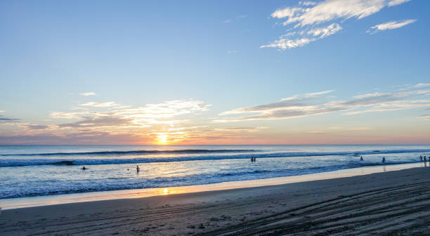 istock People in Water at Beach 999678056