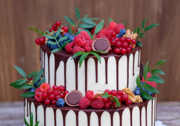 istock wedding cake in two tiers with fresh berries 999683978