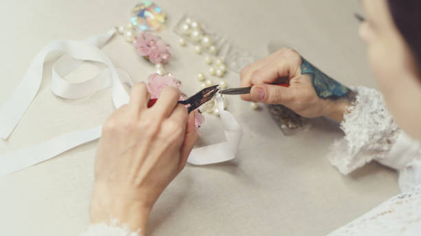 istock Girl is making jewelry 999696554