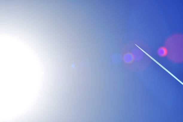 Contrails, Condensation trails, Vapour trail from an aircraft in the sky above Auckland city
