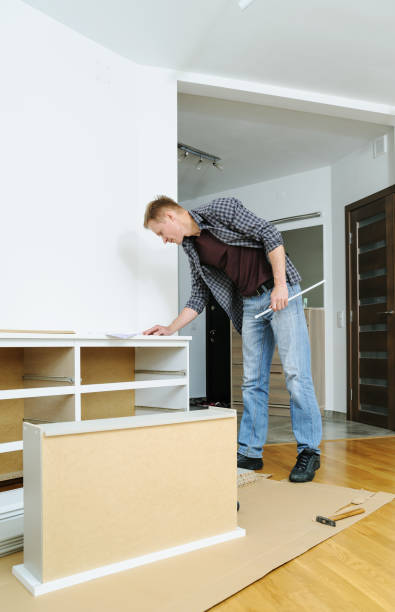 istock Furniture assembly at home. 999734976