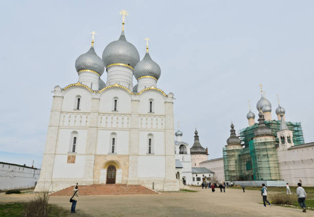 Rostov, Russia - May 3, 2013 : Unidentified tourists at Assumption cathedral in Rostov Kremlin, Russia