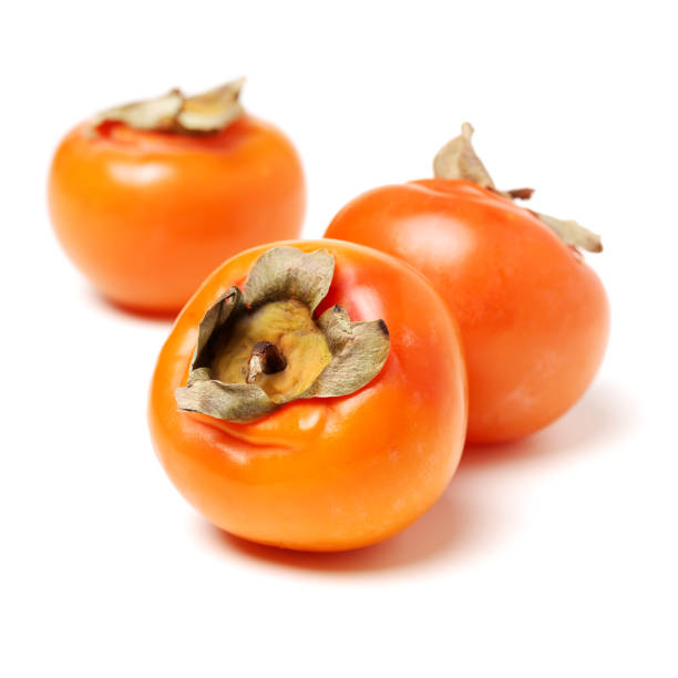 istock Japanese Fuyu Persimmon on white background 999760680