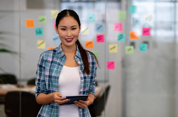 istock Creative woman brainstorming at the office 999791130