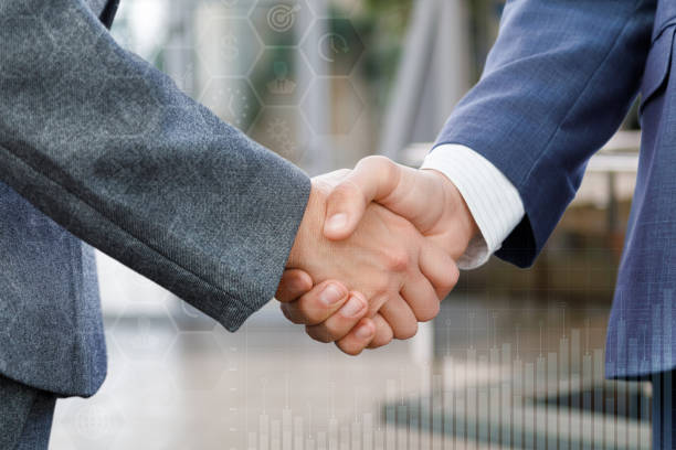 istock Friendly handshake of two businessmen. 999794668