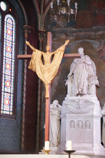 istock golden christ on cross 999797386