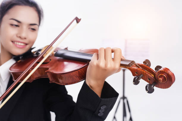 istock In selective focus of violin was playing by student,blurry light design background 999808350