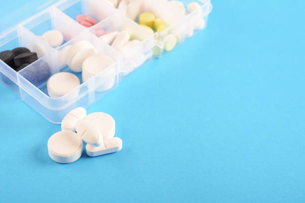 istock Medicine box with pills. 999811980