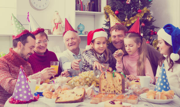istock Family enjoying Christmas dinner 999812436