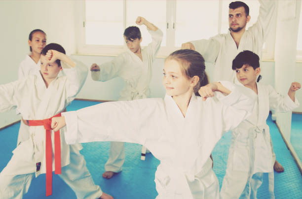 istock Happy children attempting to master new moves 999814550
