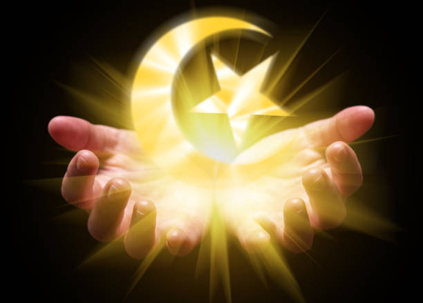 istock Hands cupped and holding or showing the Crescent. 999817902