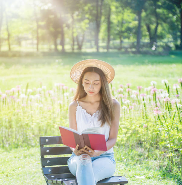 istock Student reading a book in the park. Ready to go to University. 999830804