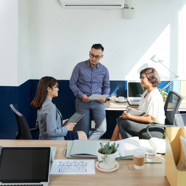 istock Talking business people 999833726