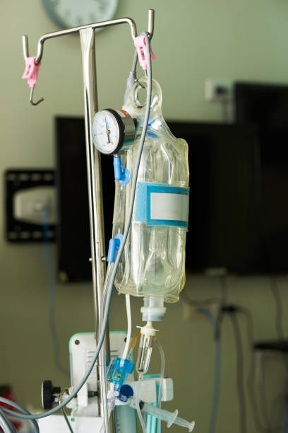 istock Fluid bag hanging on the pole in operating room 999839992