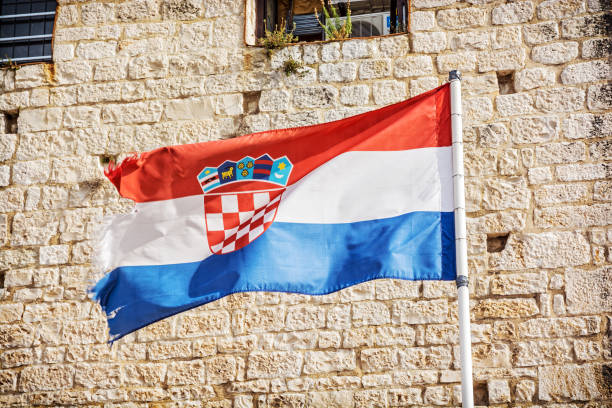 istock Croatian flag on stone background 999842940