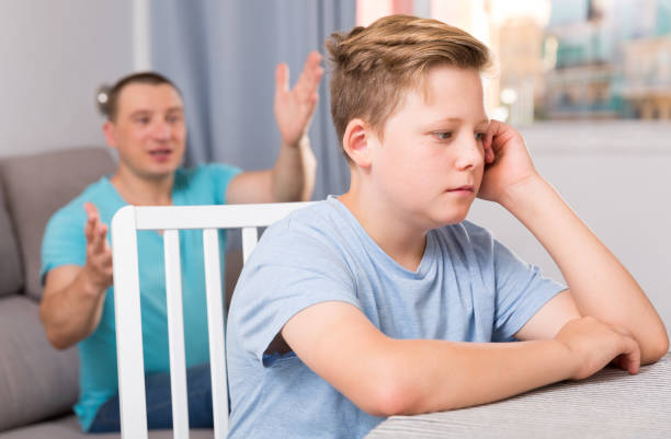 istock Man is offended and son is not wanting talking with him 999845622