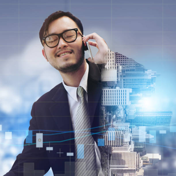 istock Double exposure businessman using mobile phone. 999852658