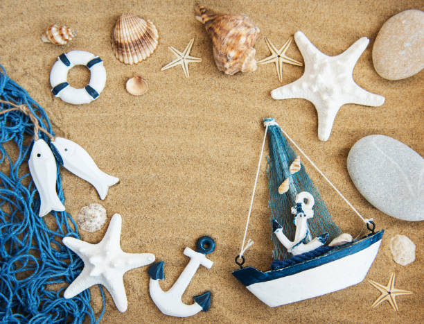 istock Seashells and sea decorations with rope 999856370
