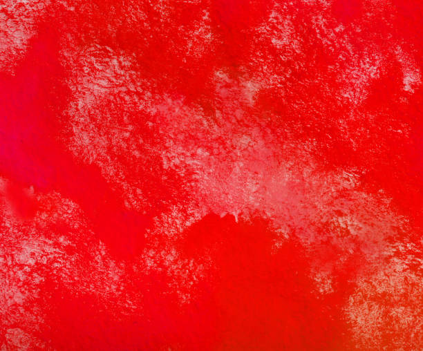 istock red watercolor splash stroke background 999862164