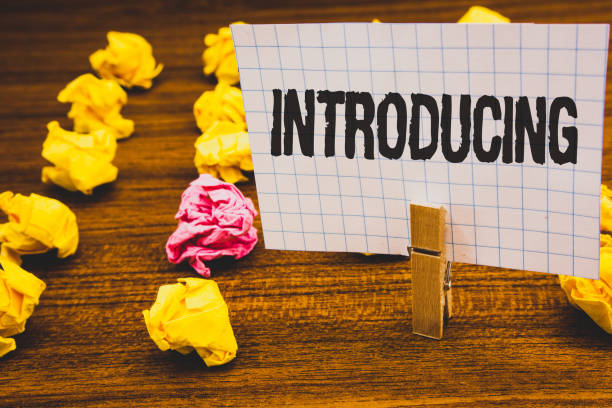 istock Conceptual hand writing showing Introducing. Business photo text Presenting a topic or someone Initial approach First meeting Clothespin hold holding notebook paper crumpled papers ideas. 999869038