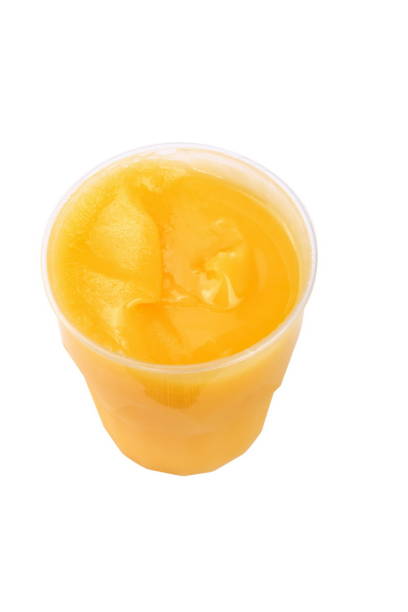 istock yellow honey in plastic figured container isolated on white background at dry sunny day 999884084
